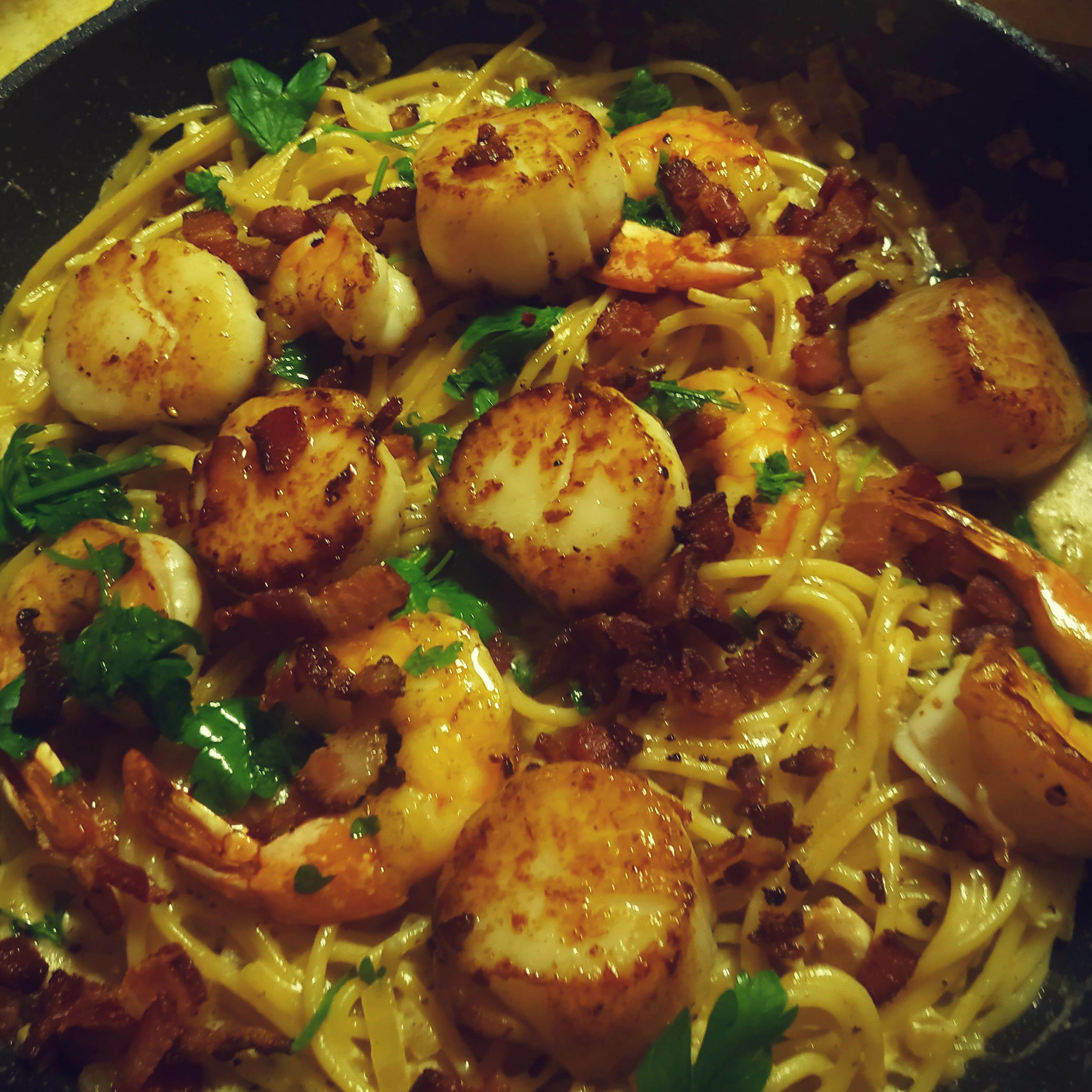 I seared scallops and shrimp and served them on carbonara. Dining and
