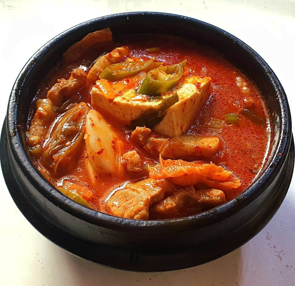 Kimchi jjigae with rice cakes
