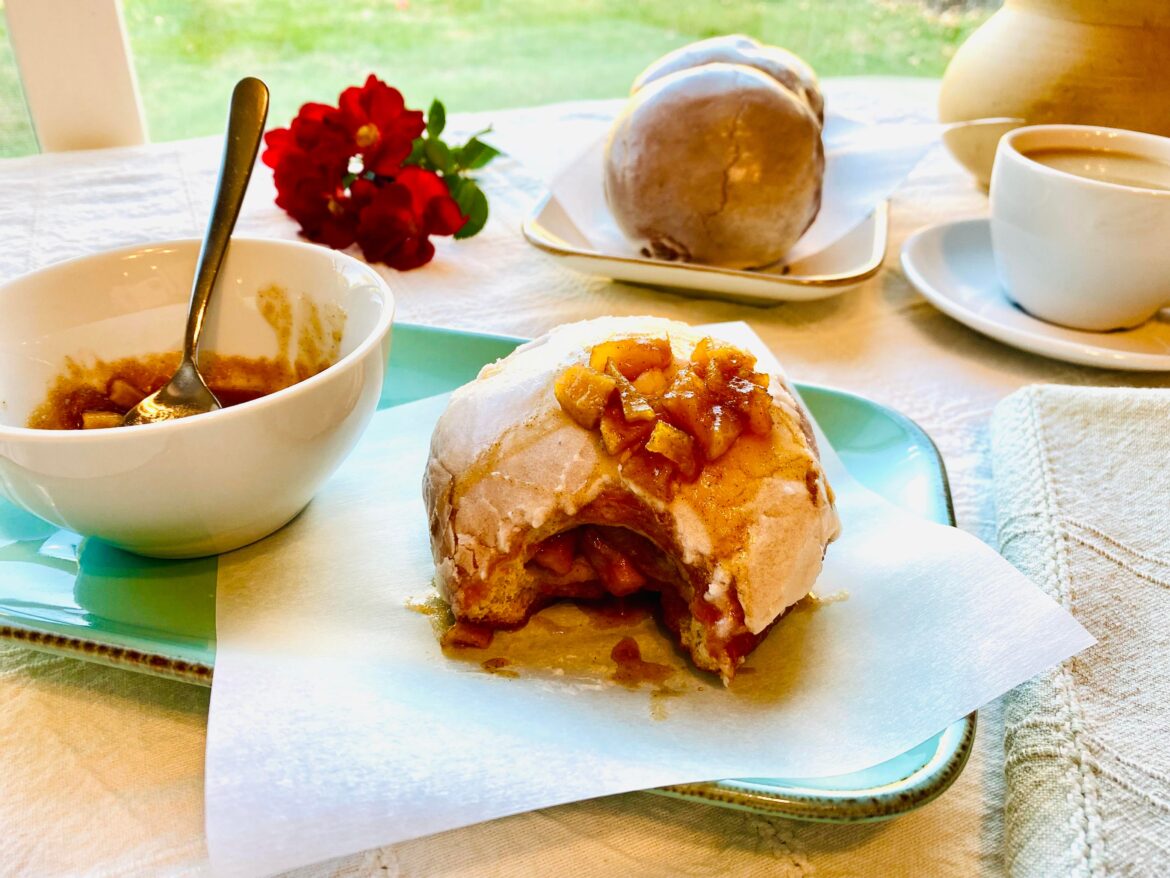 Apple pie filled doughnuts with cream cheese glaze