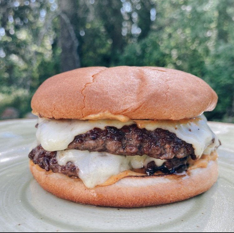 A simple burger with Monterey Jack cheese Dining and Cooking