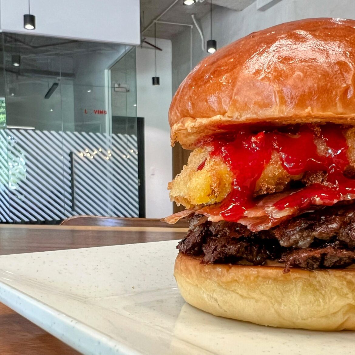 Elvis Burger: double smash, American cheese, triple bacon, fried banana, peanut butter, raspberry coulis