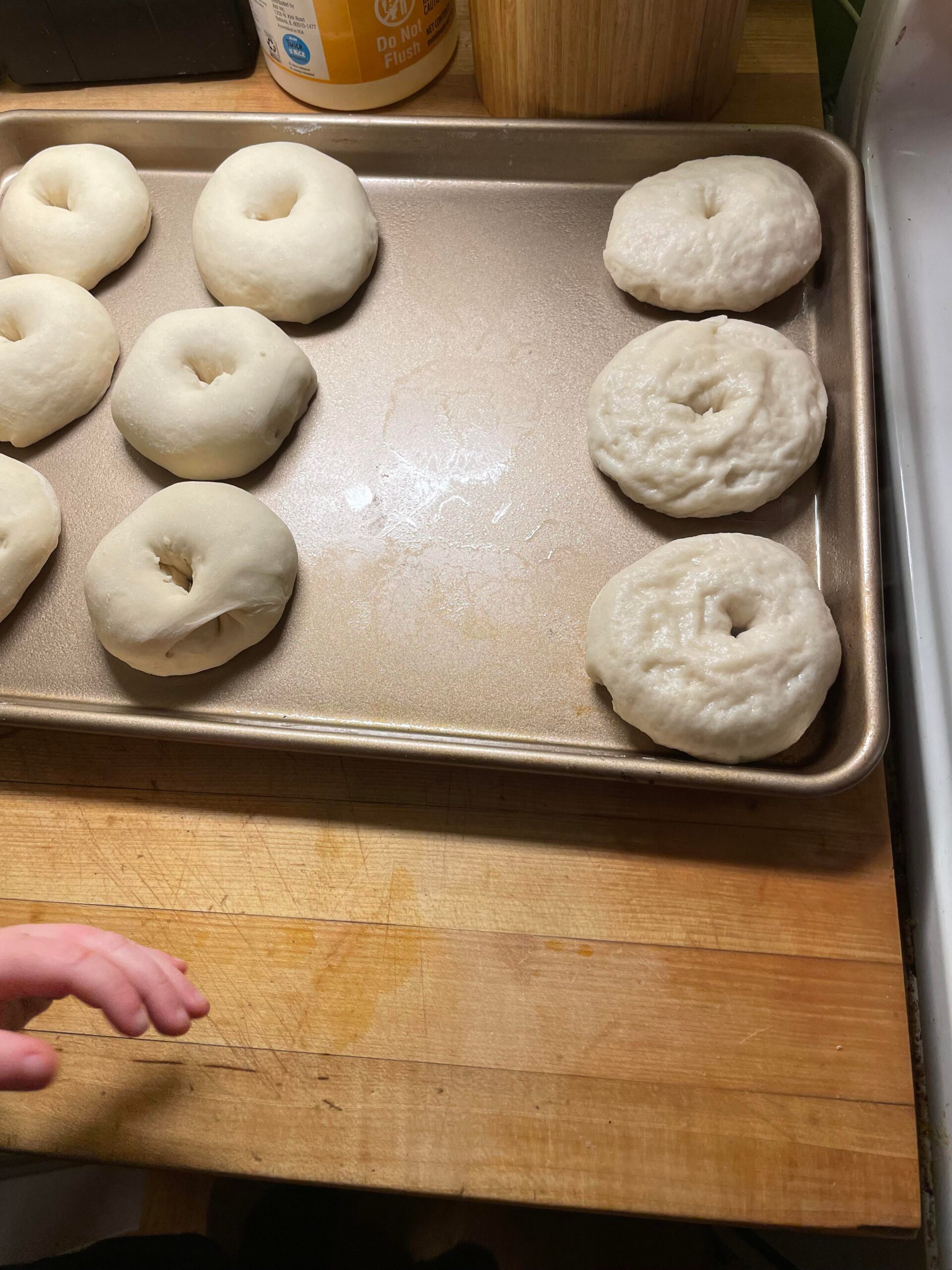 Why are my bagels wrinkly after boiling? Boiled is on the right and pre
