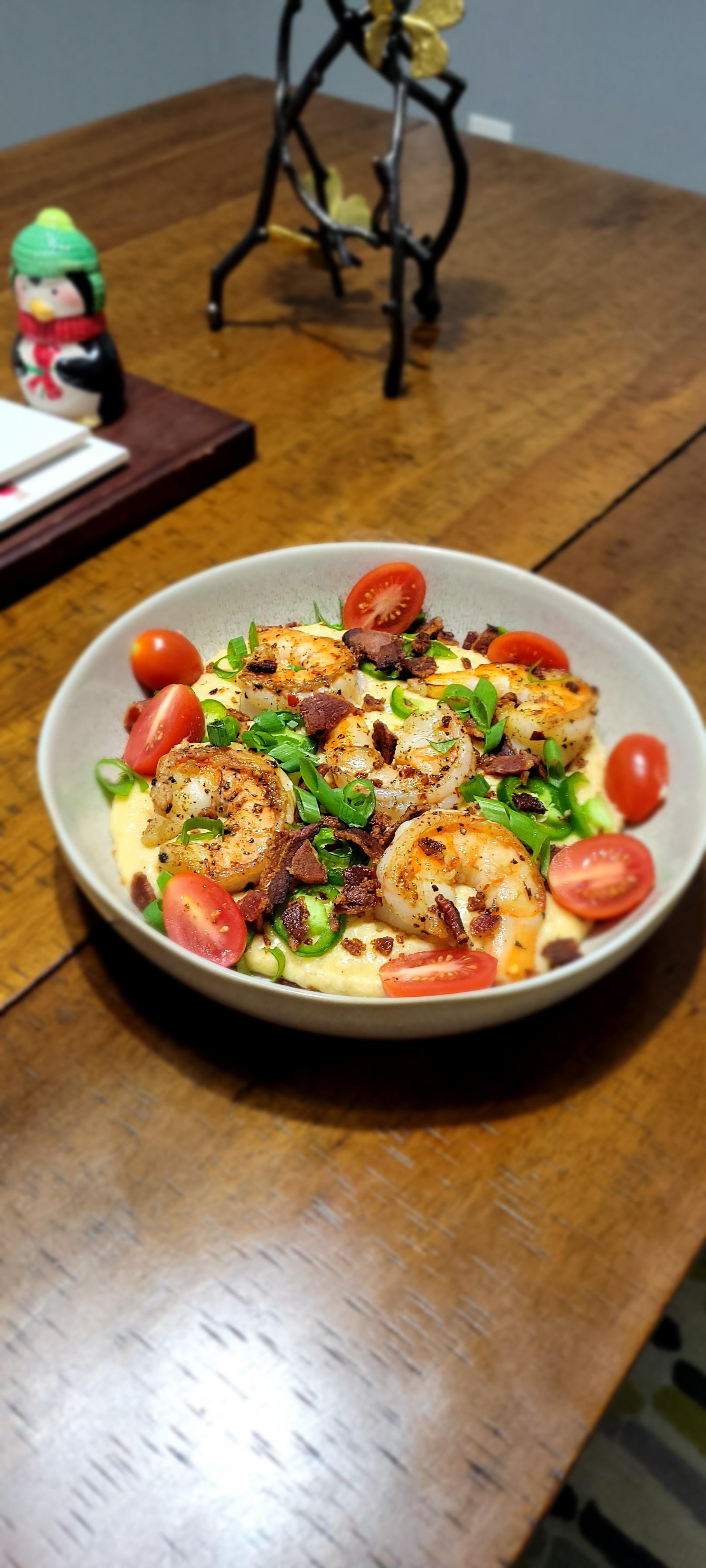 Gulf shrimp, jalapeño sharp cheddar cheese grits, bacon, with scallion