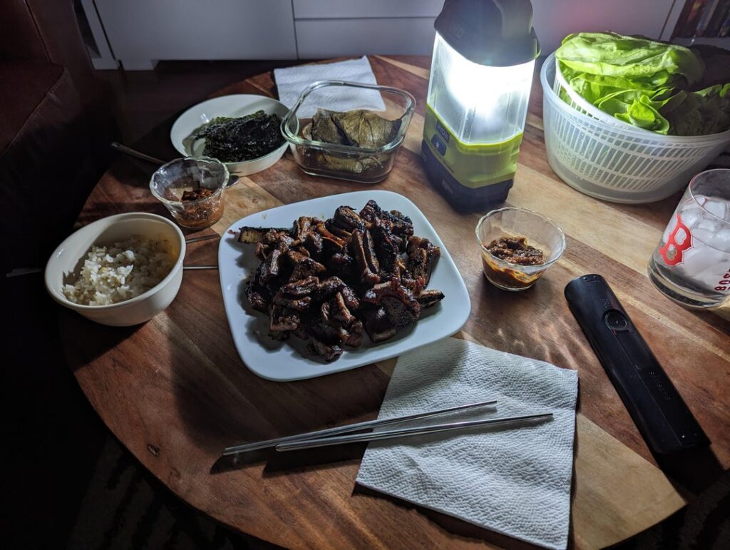 Eating LA 갈비 by lantern. Lost power due to the storm in the Northeast US