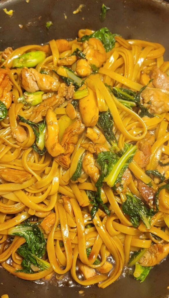 rice noodle chicken stir fry with baby bok choy