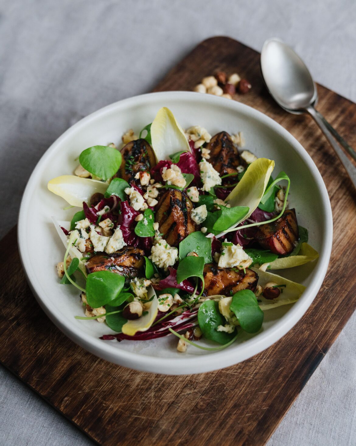 Grilled Plums, Blue Cheese & Chicory with Roast Hazelnut Dressing