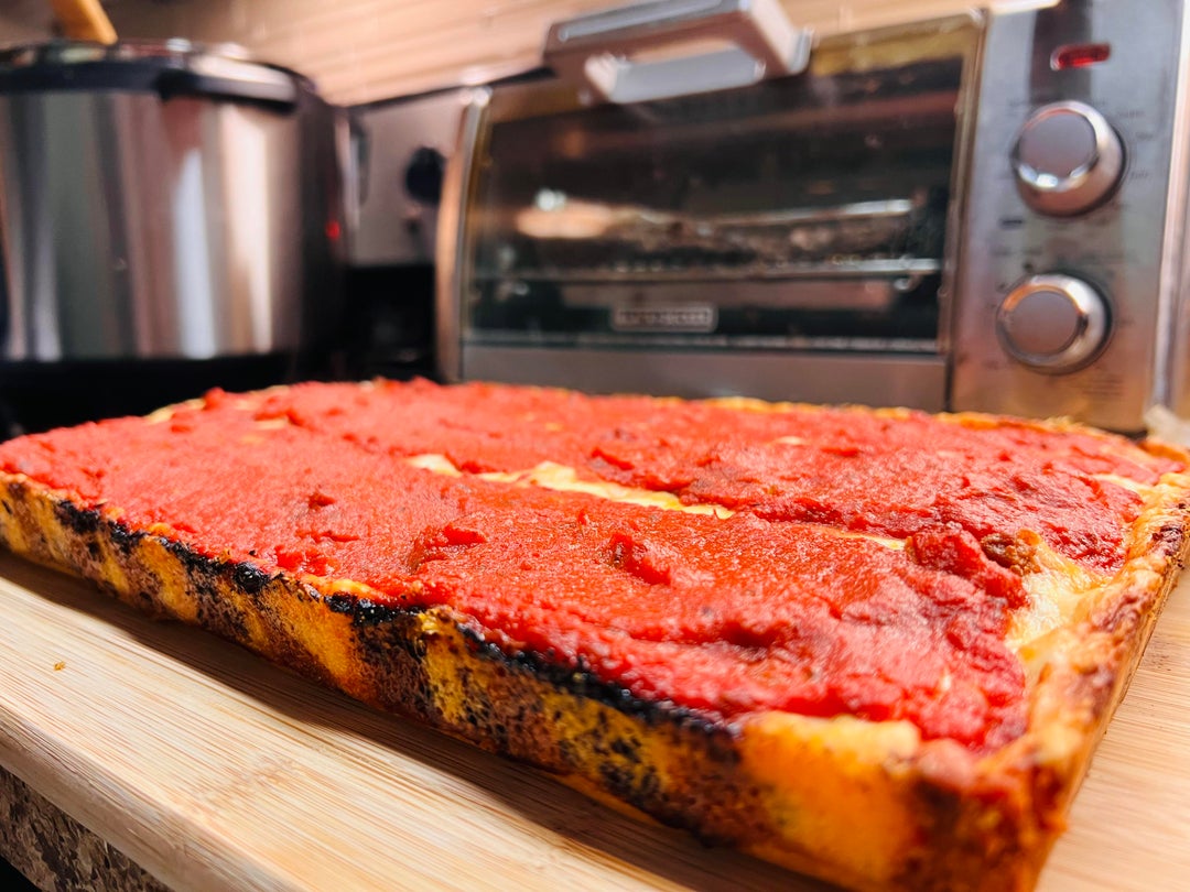 Detroit Style Don’t Hold the Sauce, Man Dining and Cooking