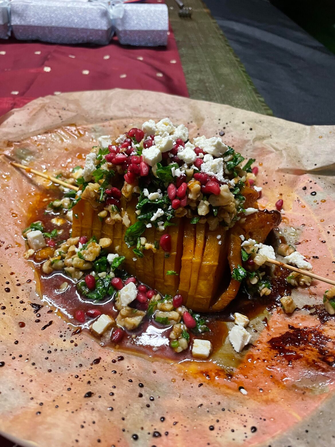 Christmas Main - honey and nutmeg slow roasted hassleback butternut pumpkin (squash) with walnuts, pomegranate and feta. Ah-mazing.