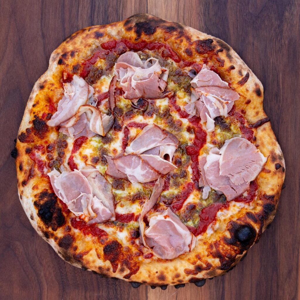 Sourdough Pizza w/ Spicy Capicollo, Homemade Basil Pesto, &amp; Red Sauce