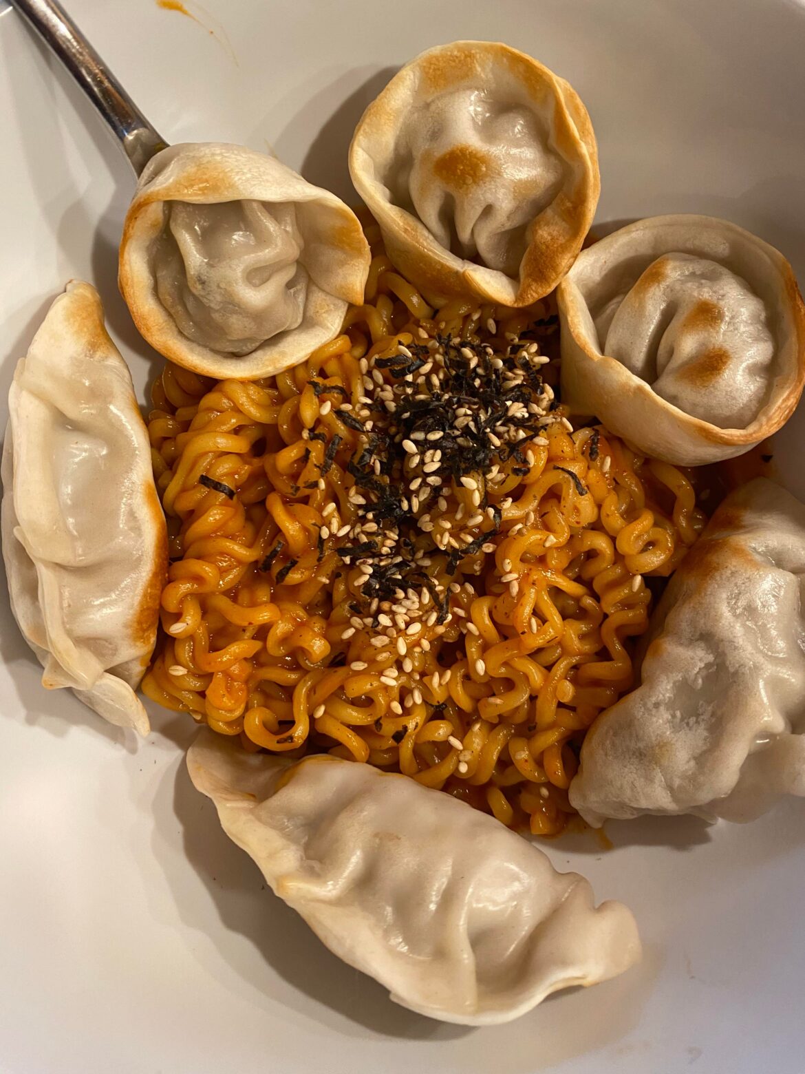 Air-fried some leftover New Years mandu and added it to a bowl of Buldak ramen (with a spoonful of peanut butter stirred in as well) for a hastily-made quick lunch. Didn’t know what to expect, but actually it wasn’t too bad. Please don’t report me to r/stupidfood lol.
