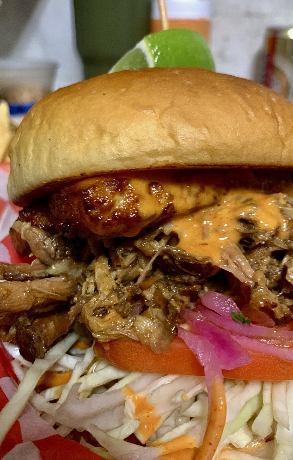 The Bruno. Pulled pernil, fried queso blanco, yum yum sauce, shredded