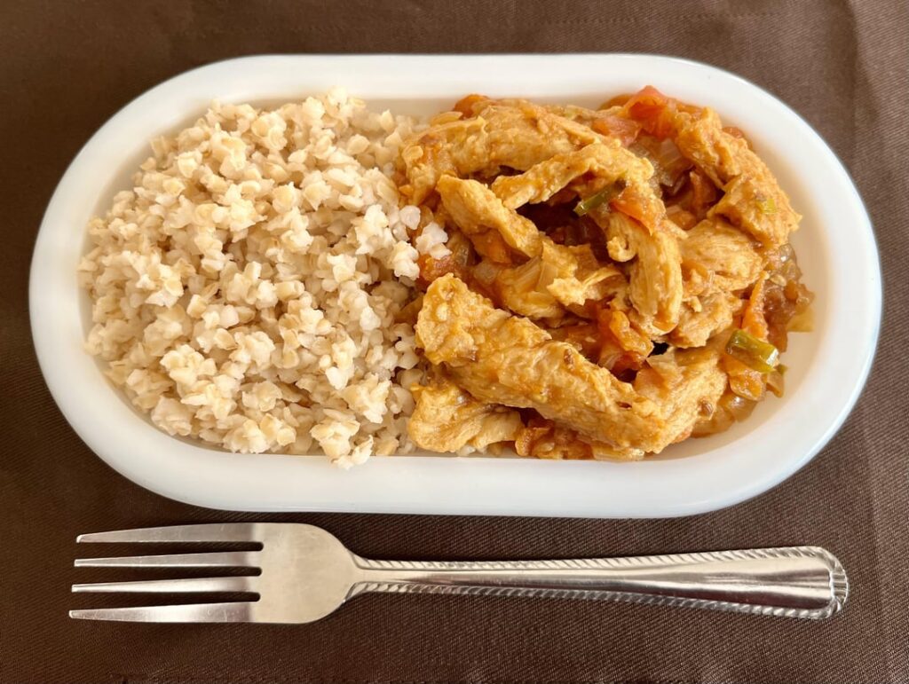 Curried soy-curls with bulgur wheat.