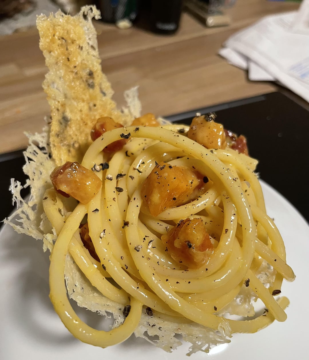 Bucatini carbonara served in a pecorino frico bowl Dining and Cooking