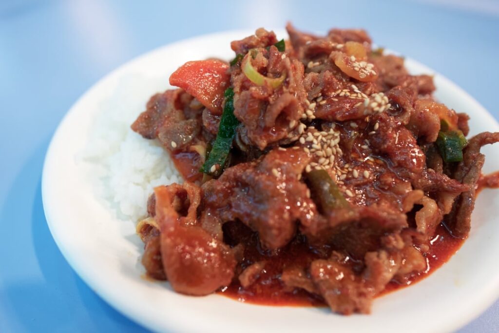 Earlier today a friend in America asked me to send her a picture of 제육덮밥 (rice topped with spicy pork) that she is craving from a restaurant in Korea, so here it is...