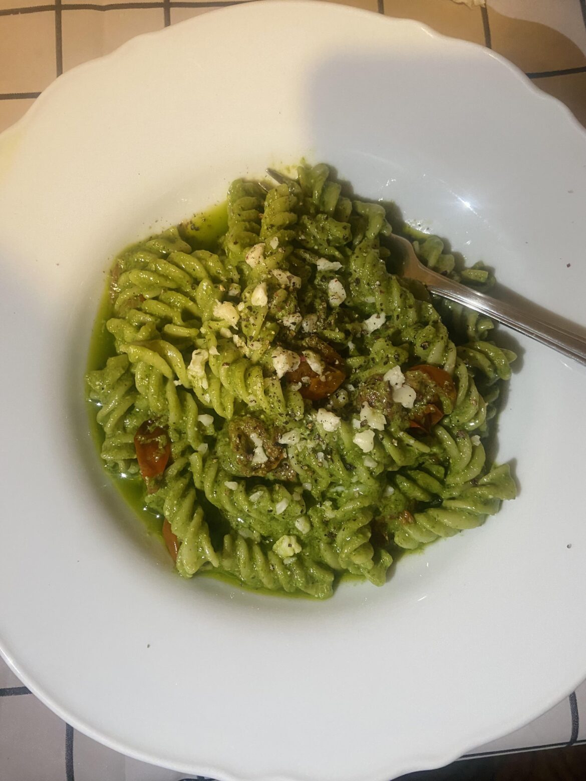 Pesto fusilli with tomatoes
