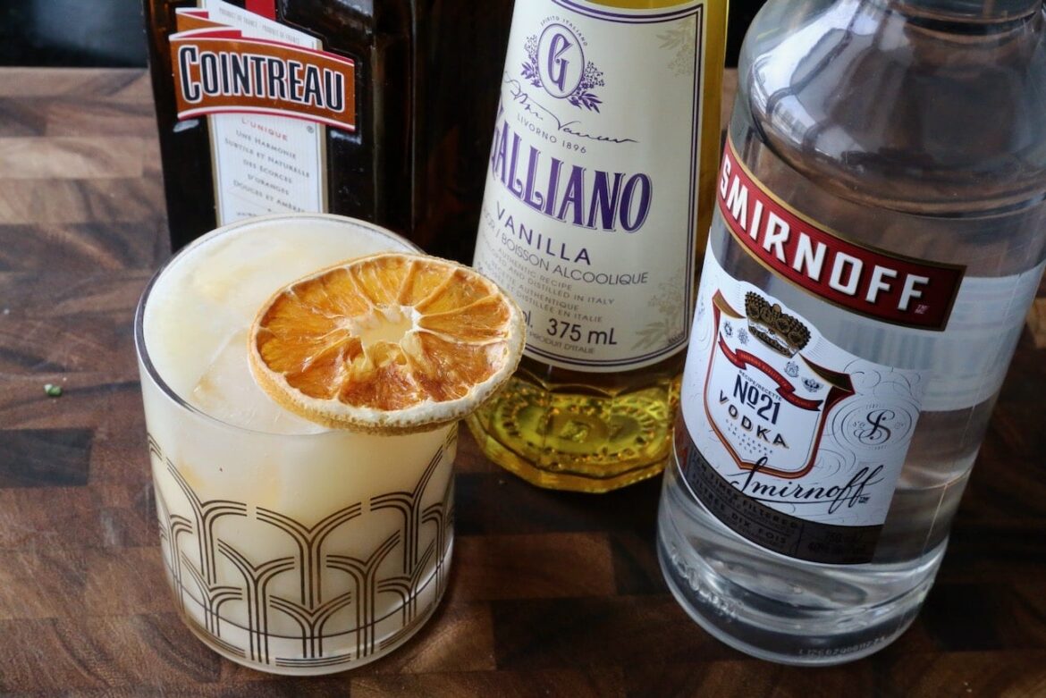 Creamy Dreamsicle Cocktail featuring vodka, Galliano, Cointreau, freshly squeezed orange juice and cream!