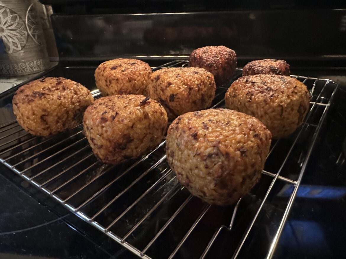 been obsessed w these kimchi rice balls filled w mozzarella cheese. the outside has such a nice crunch but the rice on the inside still tender !!