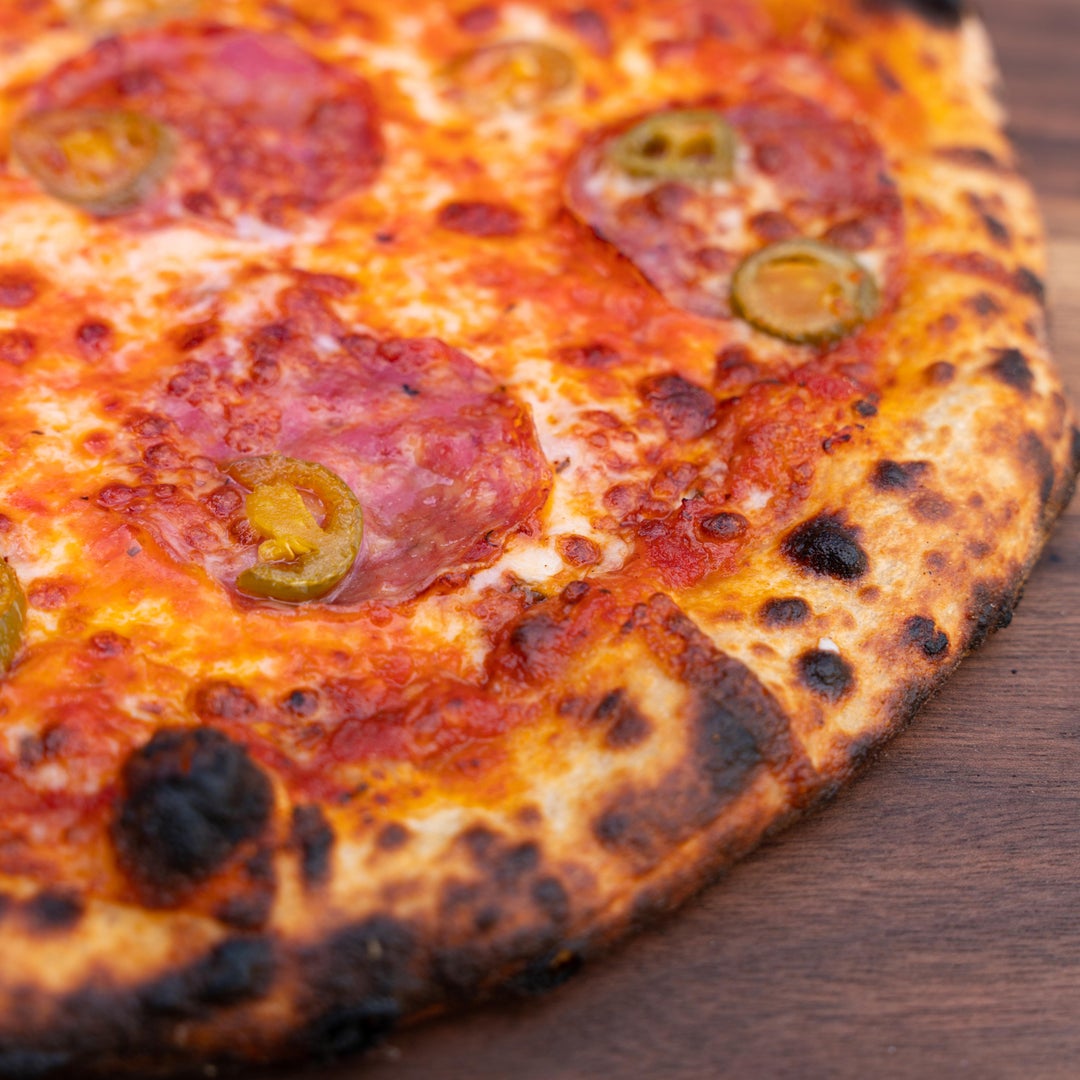 Spicy Sourdough Pizza w/ Genoa Salami, Jalapeños, & Chili Oil Dining