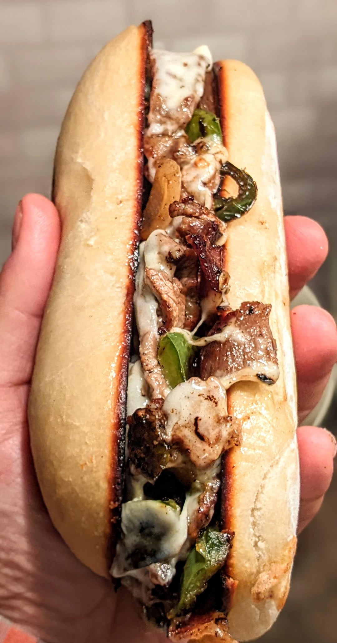 Homemade Philly cheese with the homemade hoagie roll. Roll buttered