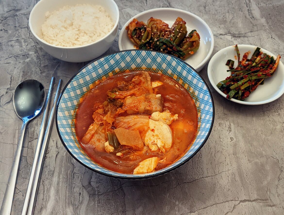 Soondubu jjigae for lunch with doenjang bok choy, and garlic chive kimchi.