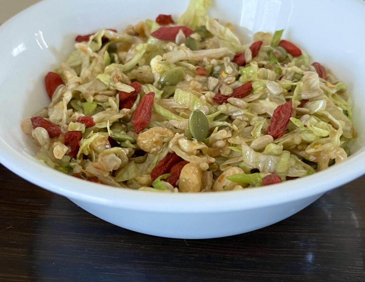 Sweet and spicy salad with nuts and seeds.