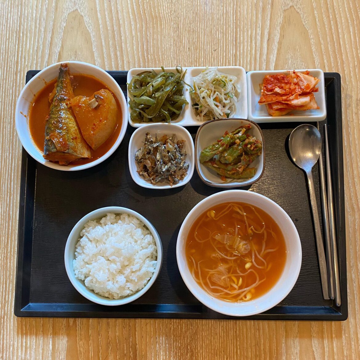 spicy braised mackerel & radish with banchan and kimchi bean sprout soup