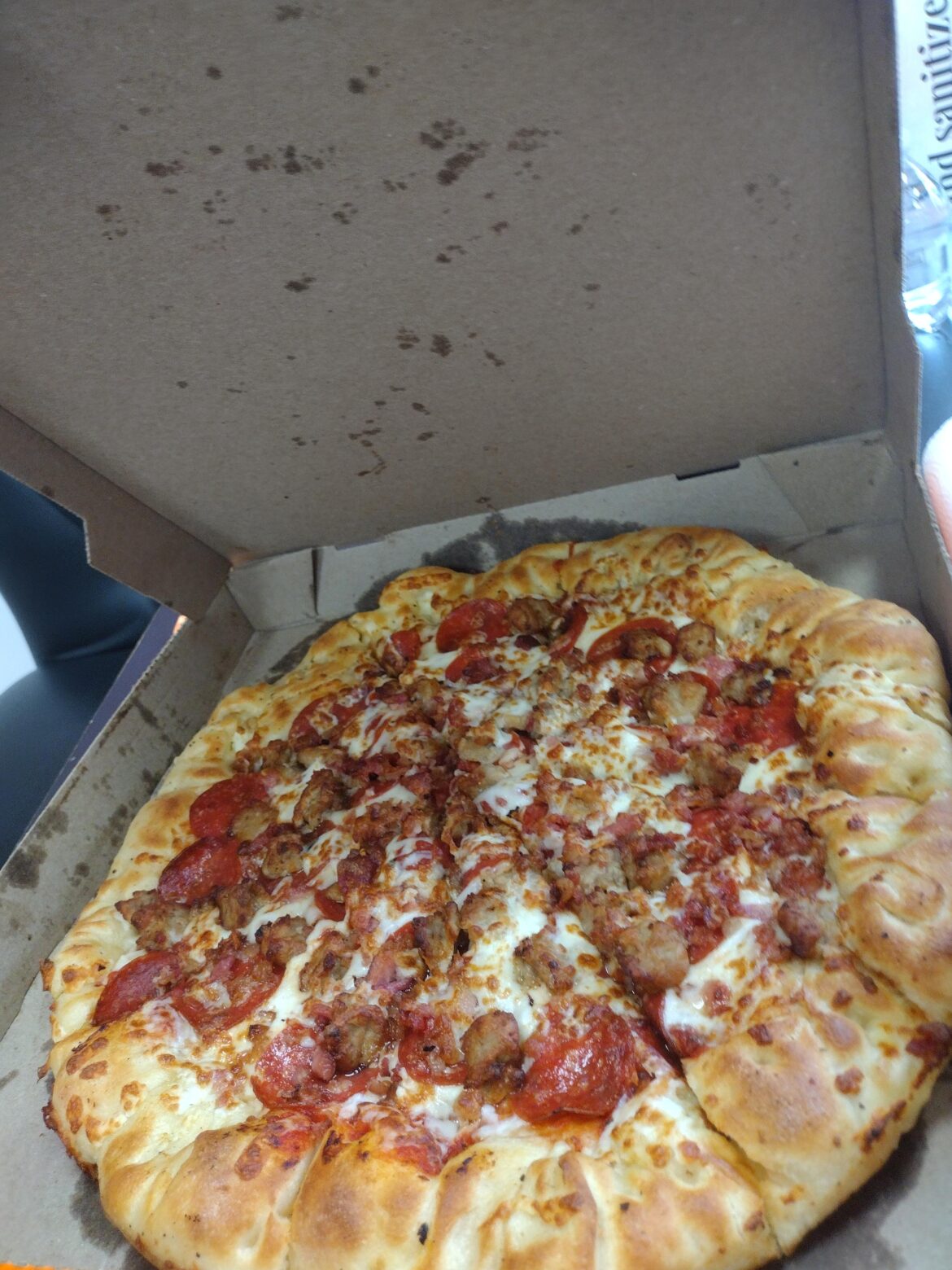 Started working at a pizza place recently. Got to make my own today!