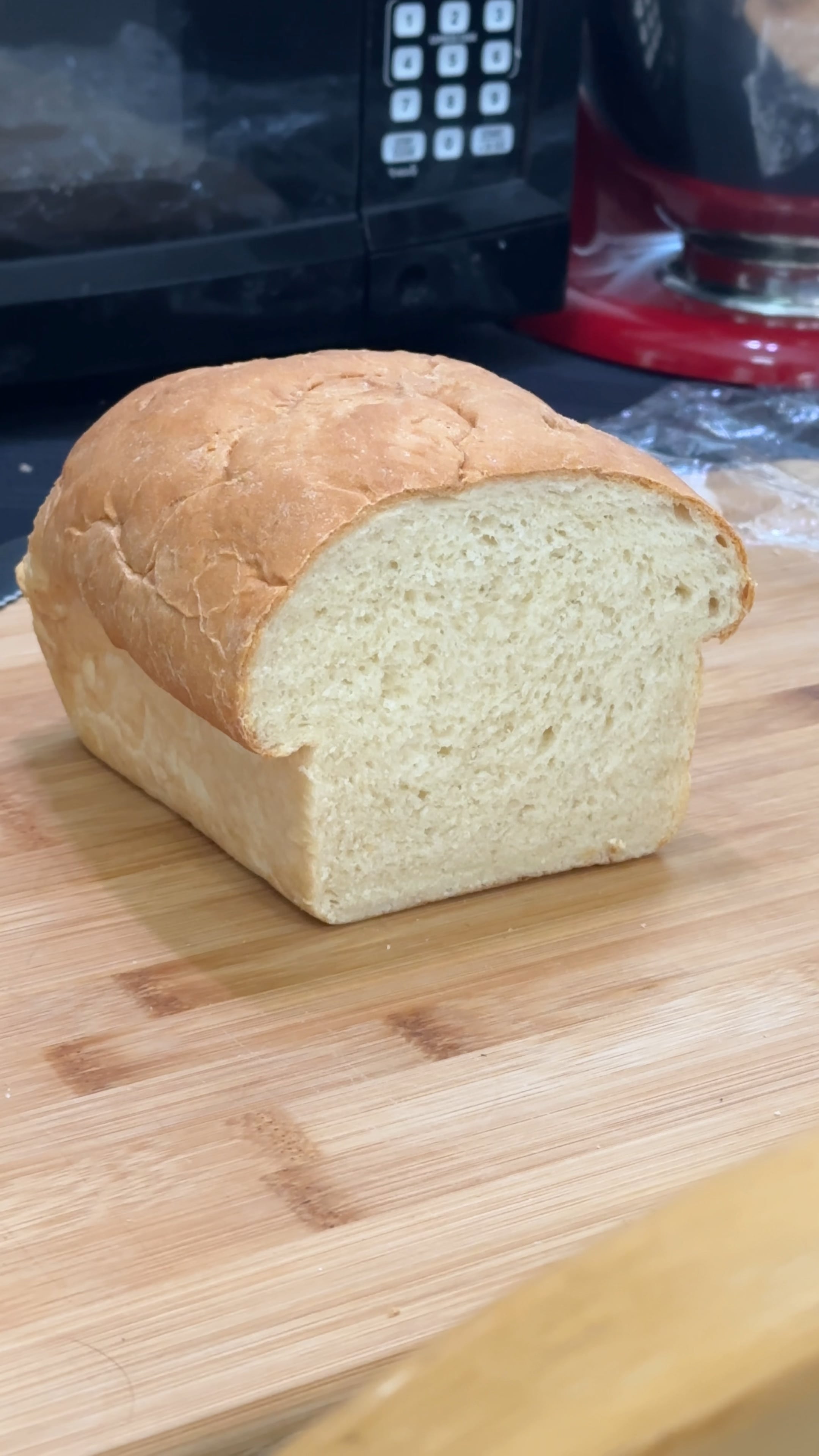 Slicing homemade King Arthur’s classic sandwich bread Dining and Cooking