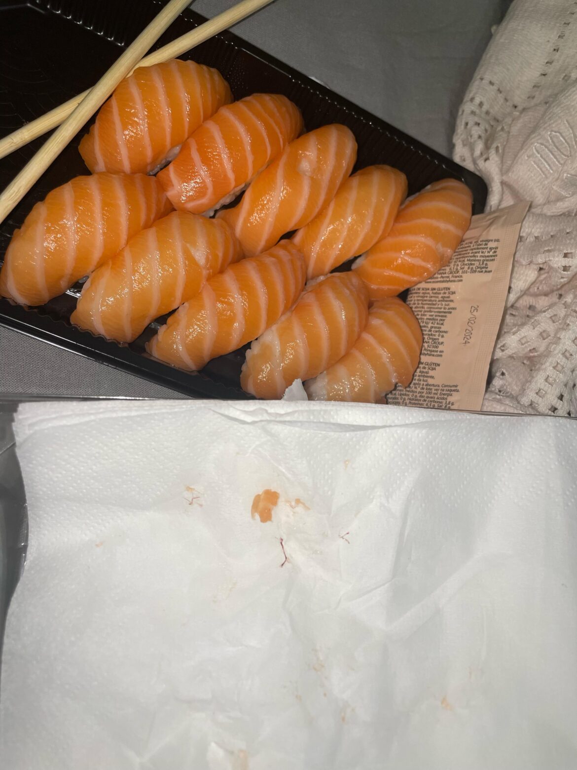 Strings in raw salmon. Is it a parasite or a blood vessel? Should I avoid eating it?