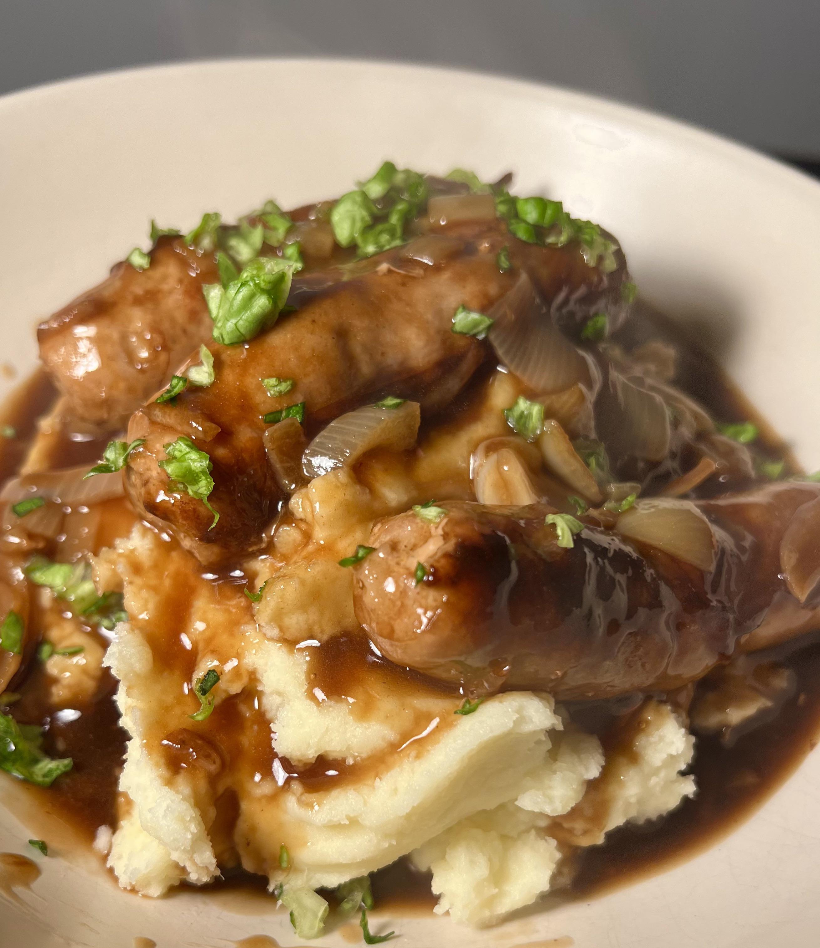 Cumberland sausage and mash with onion gravy. Dining and Cooking