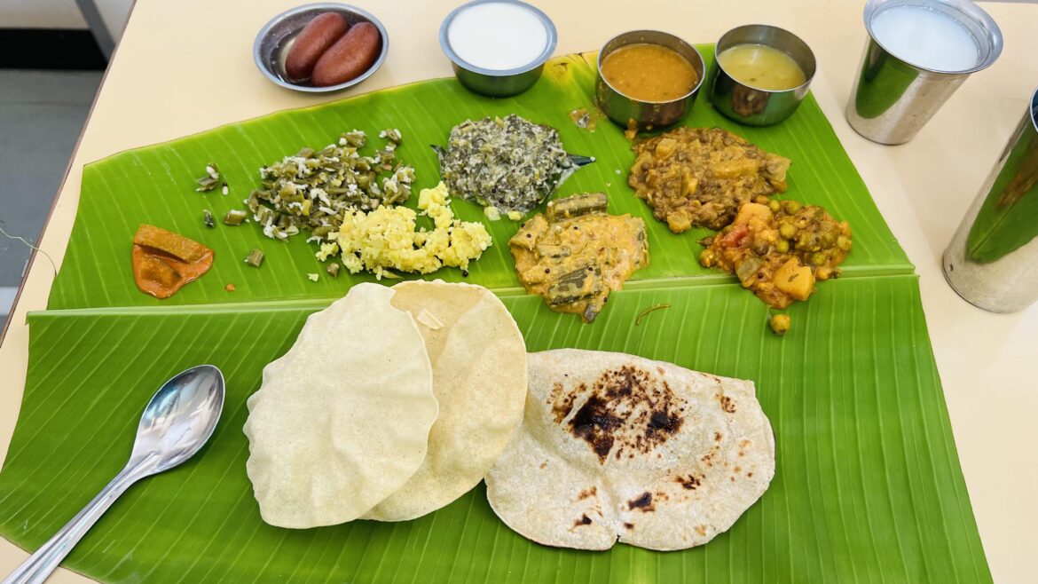 Indian vegetarian meal on banana leaf