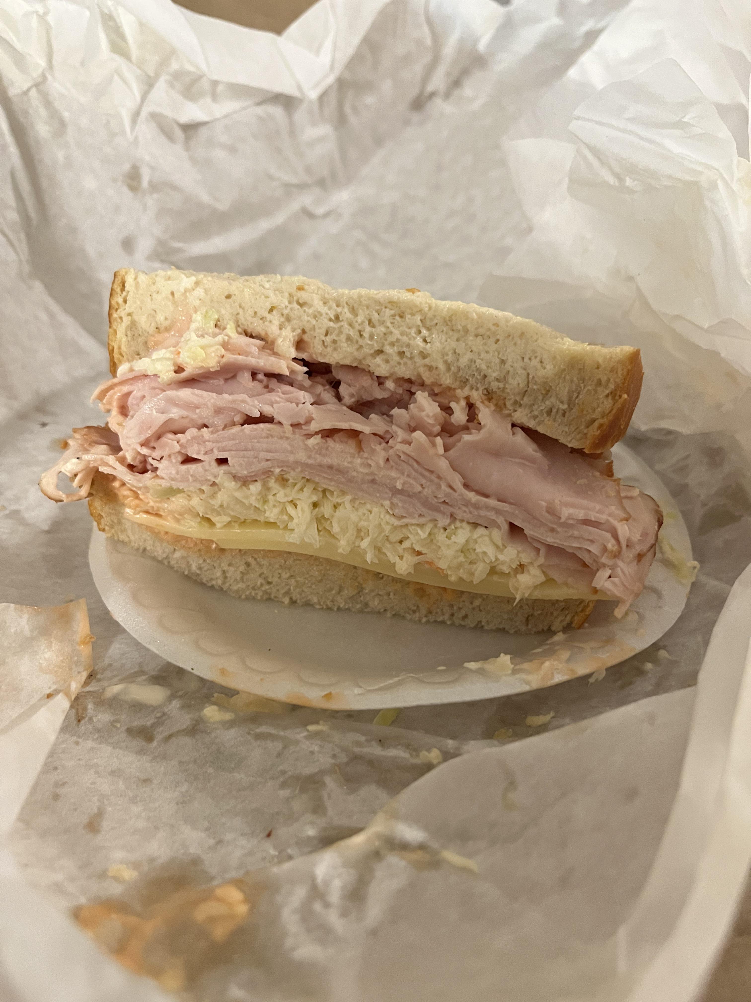 Smoked turkey, Swiss cheese, coleslaw, and Russian dressing on twice