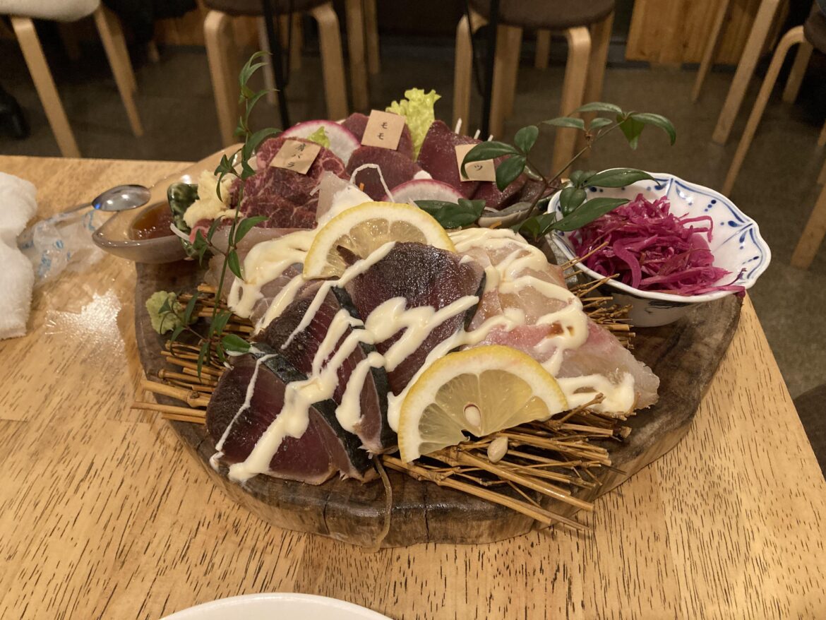 Sashimi mix, raw fish and horse