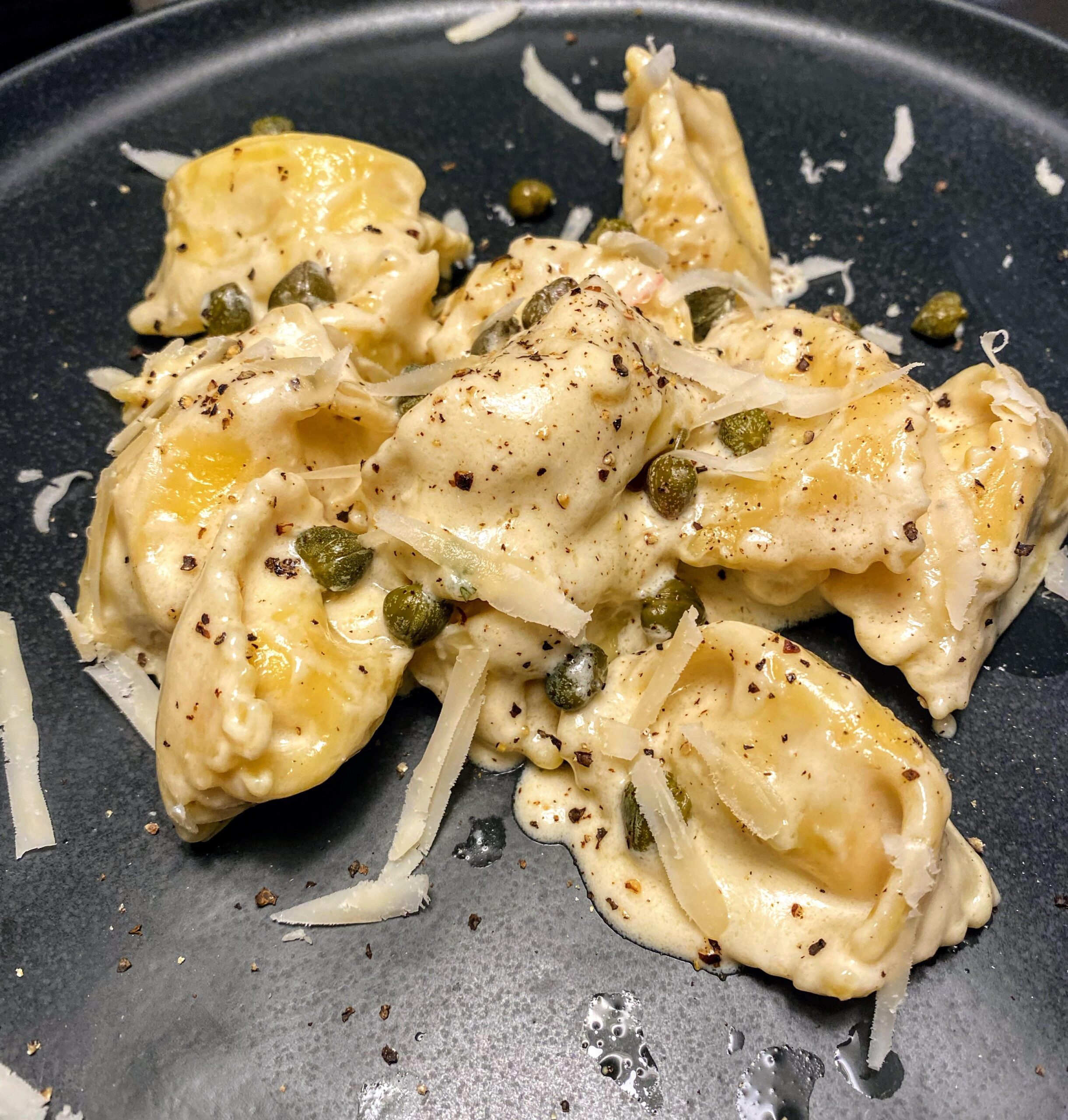 Ricotta + crab agnolotti in a lemon caper cream sauce Dining and Cooking
