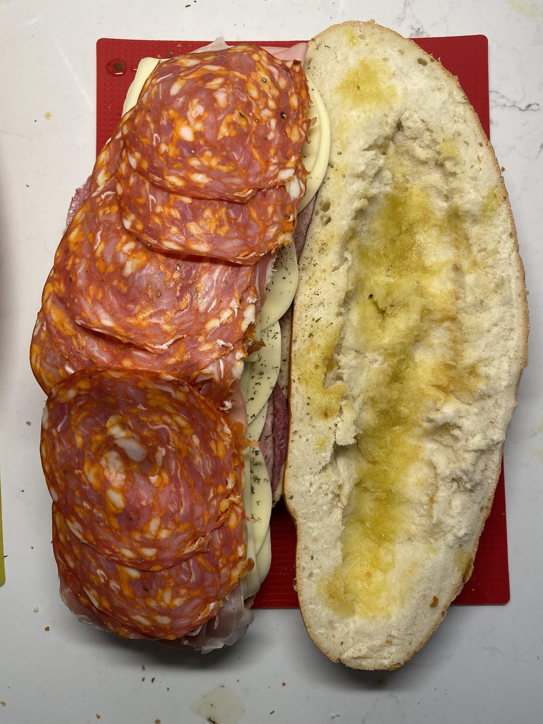 [Step by step] Muffuletta inspired sub salami, ham, provolone
