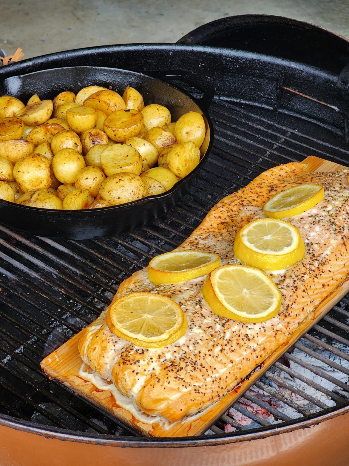 Weber kettle did it again. full slab of Atlantic salmon on a cedar plank.