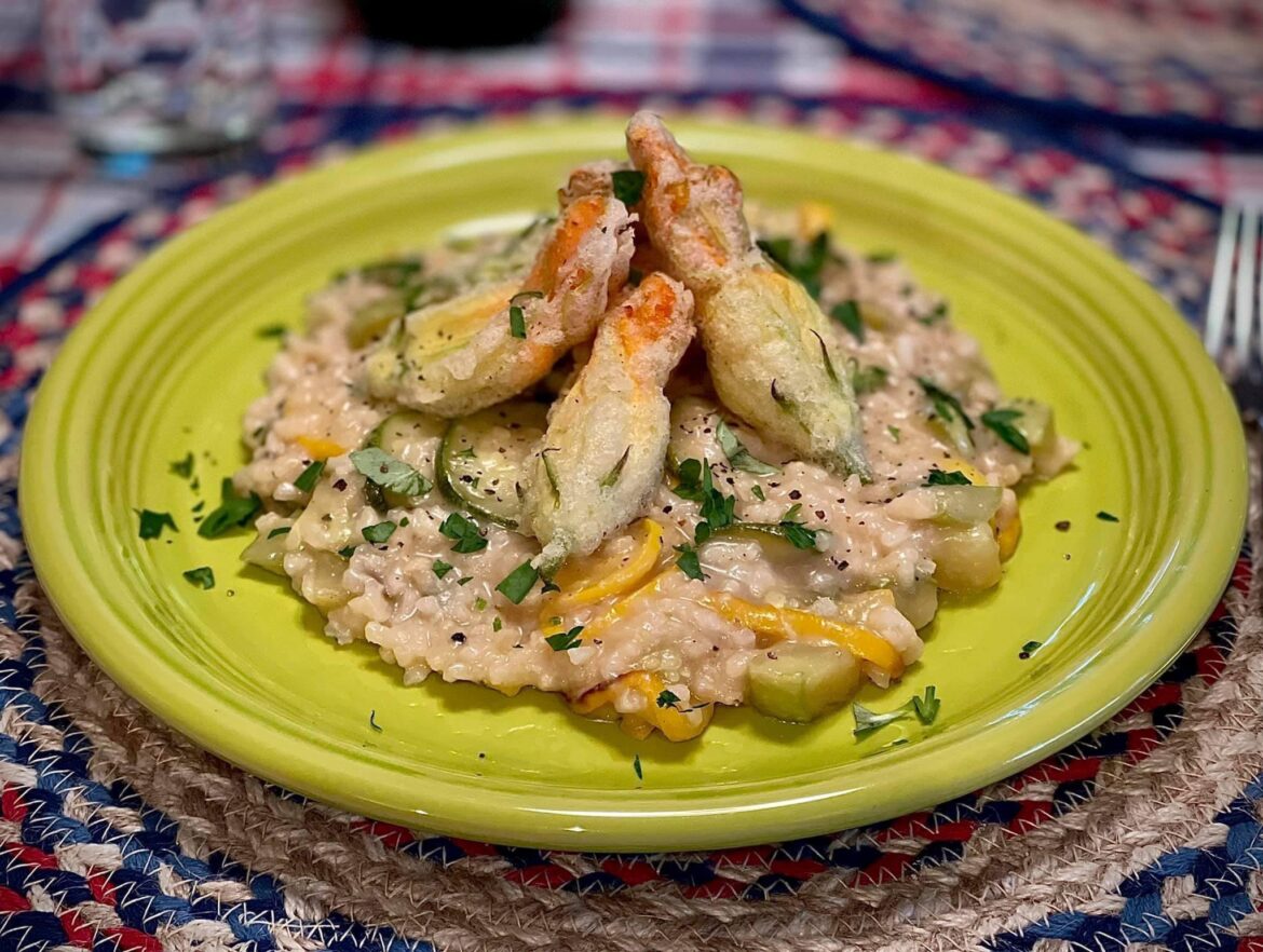 Summer squash risotto (zucchini, crookneck/yellow squash, and pattypan) with lemon and herbs, topped with fried squash blossoms stuffed with goat cheese, honey, and sumac.