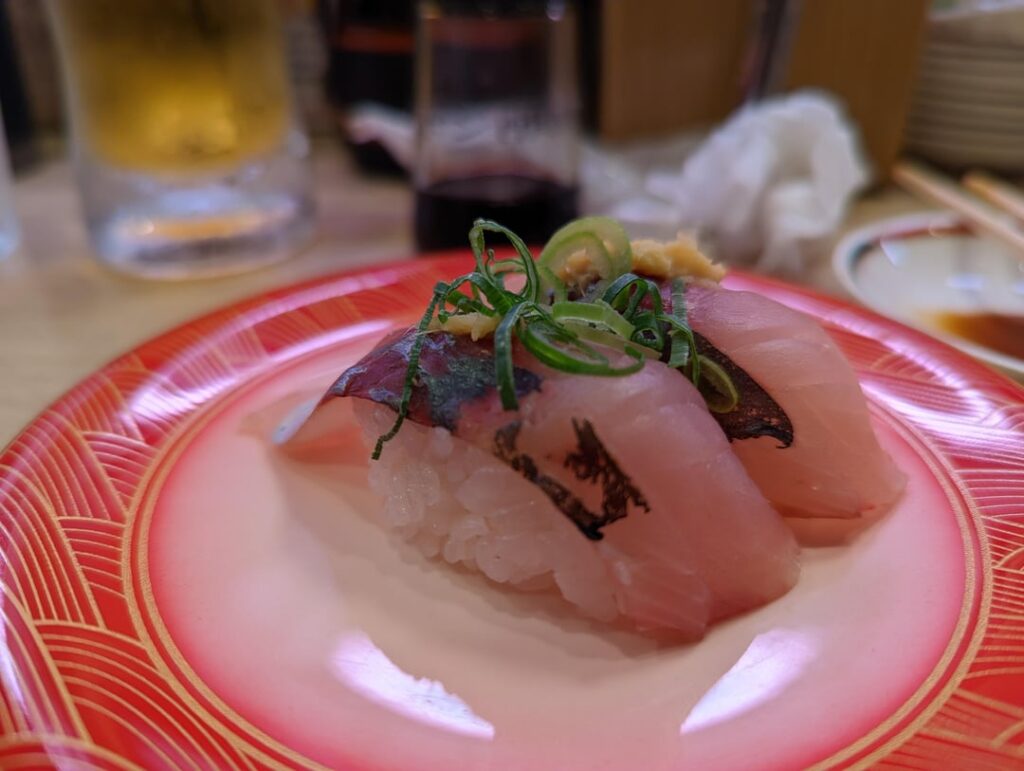 Nigiri and prices typical of a kaiten restaurant - "Musashi" in Kyoto, Japan