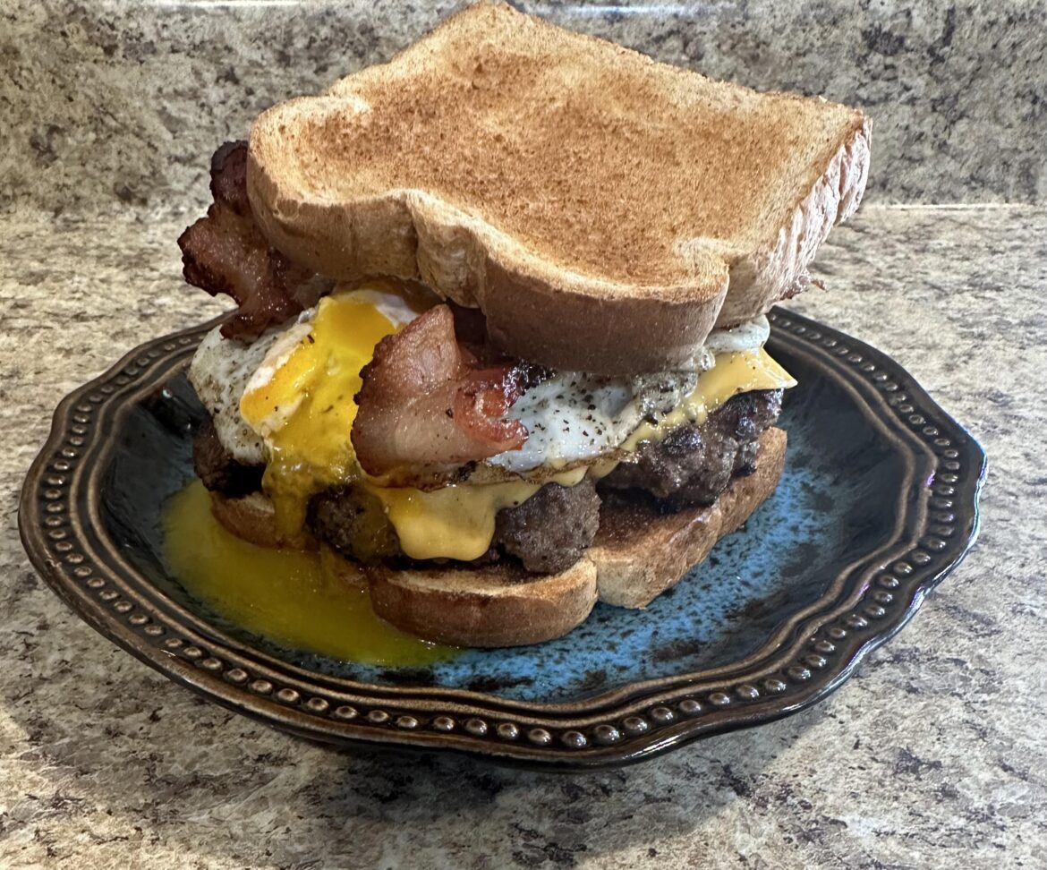 No bun no problem! Nice Friday bacon cheeseburger with an over easy egg.