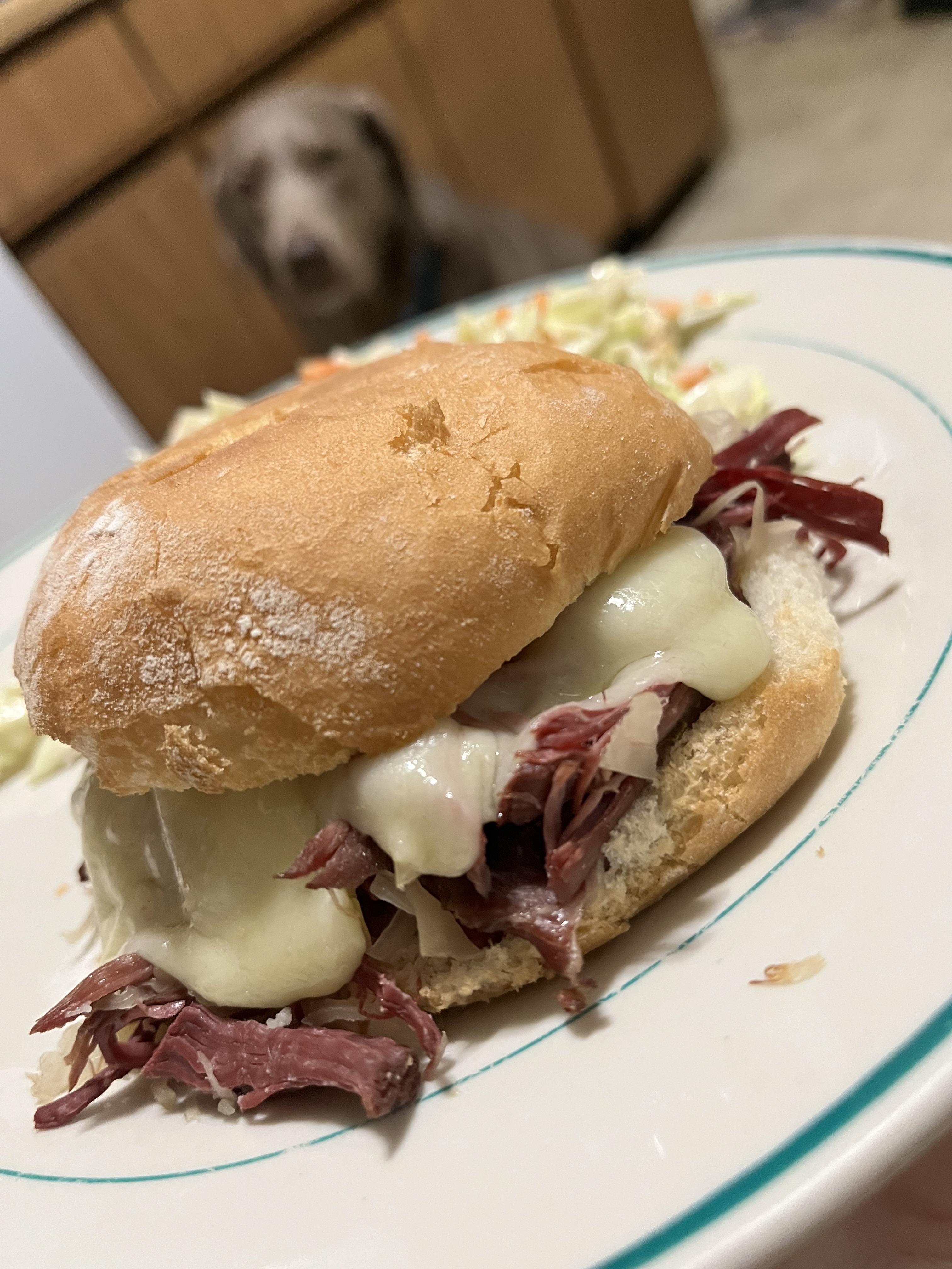 Homemade corned wild duck breast with sauerkraut, Swiss cheese, and