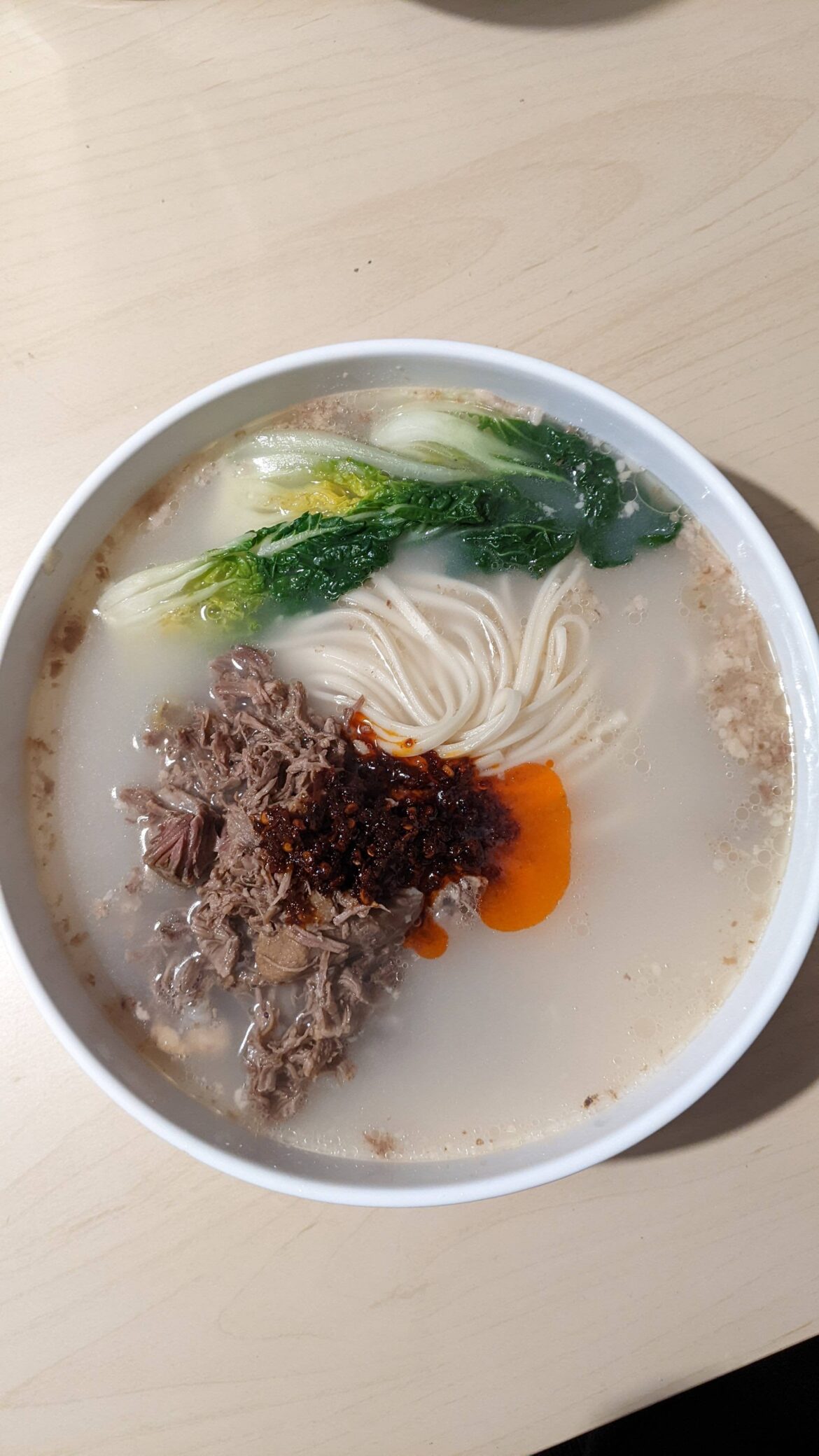 Seollongtang with chajang kuk-soo, veggies and chiu chow chili style oil