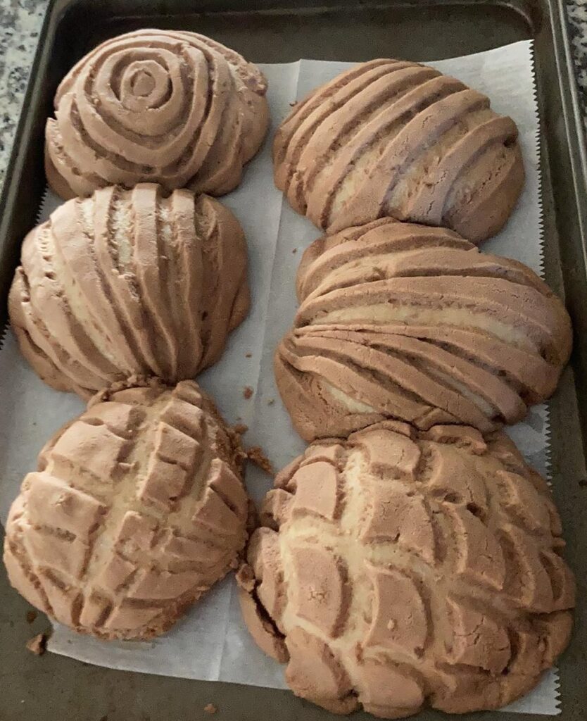I made Conchas! (Mexican Sweet Bread with a Sugar Crunch Topping) These Ones have a chocolate topping. I grew up making these with my Nana and this was my first time making them since she passed away, So it was an emotional yet really special time. I had the most fun carving the different toppings!