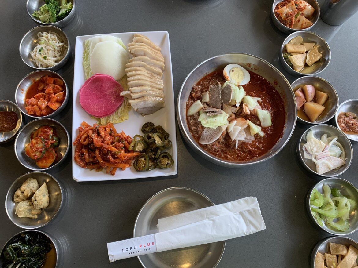 Bossam and bibimnaengmyeon with 12 different banchan