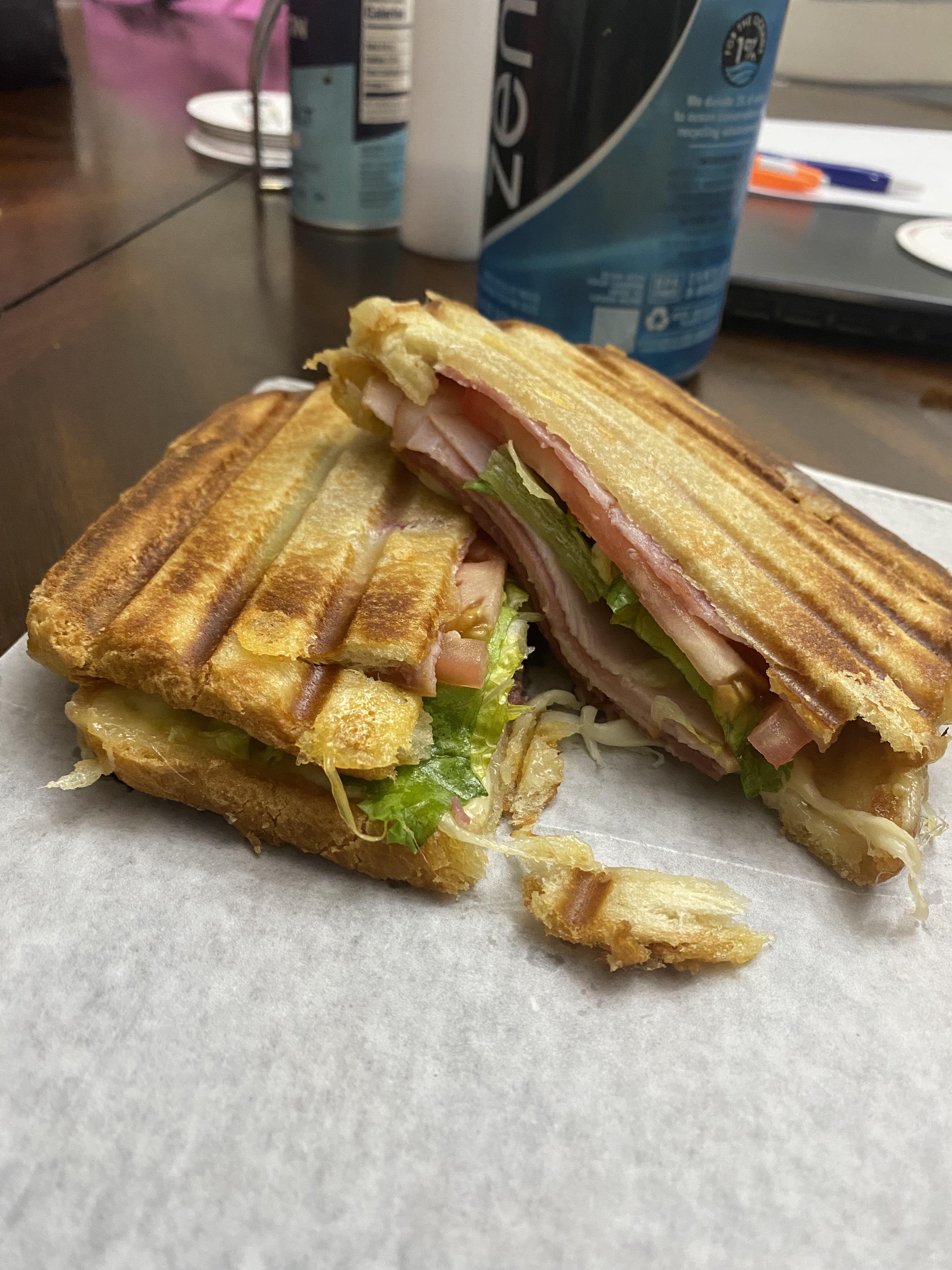 Turkey, Ham, Hard salami, 4 types of cheese,lettuce, tomato panini