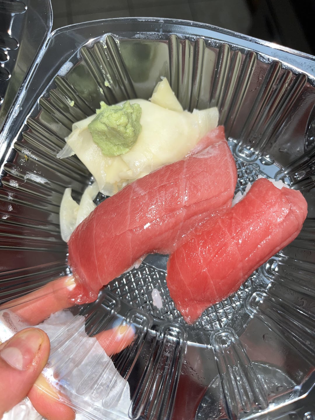 Is this nigiri fresh?? Why is it so slimy and wet lol? And what tuna