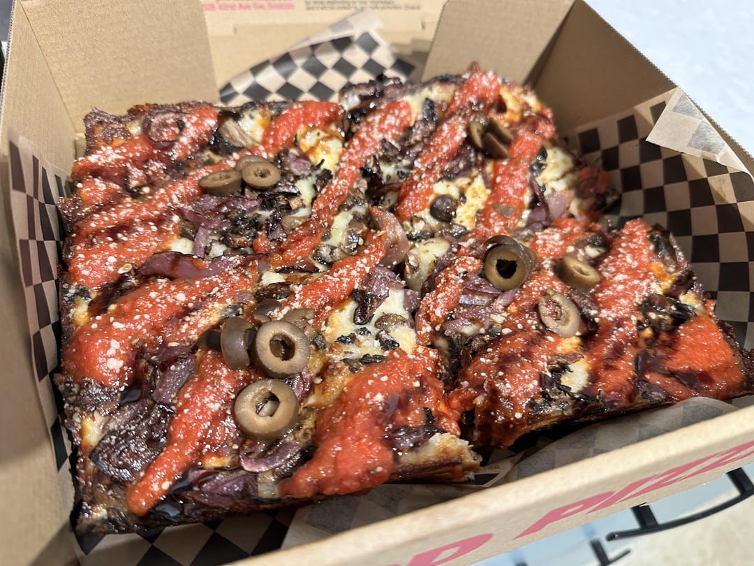 Ordered this pizza 3 months ago. Definitely worth the wait. Moto Pizza