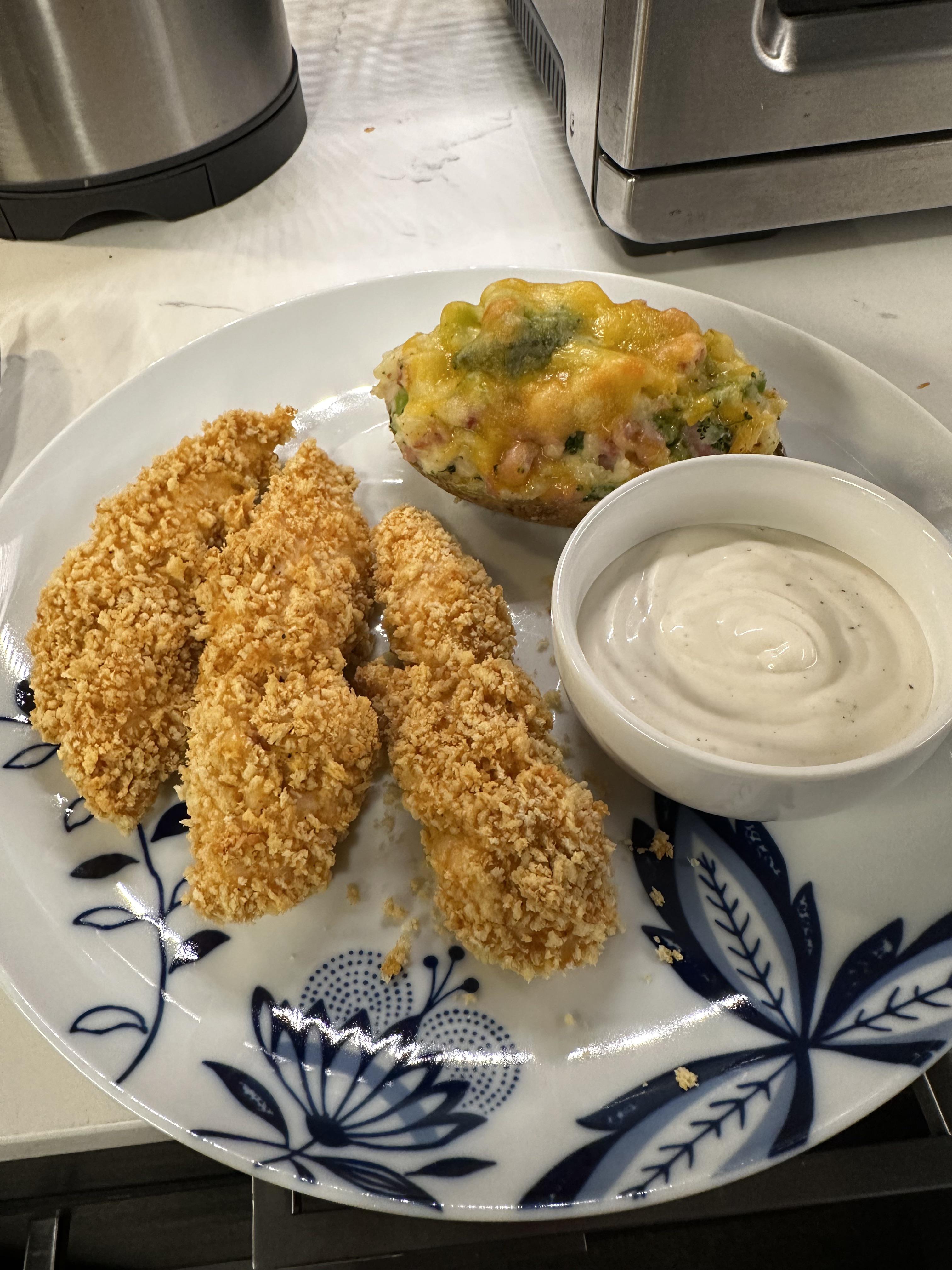 Chicken tenders and broccoli cheddar twice baked potatoes Dining and