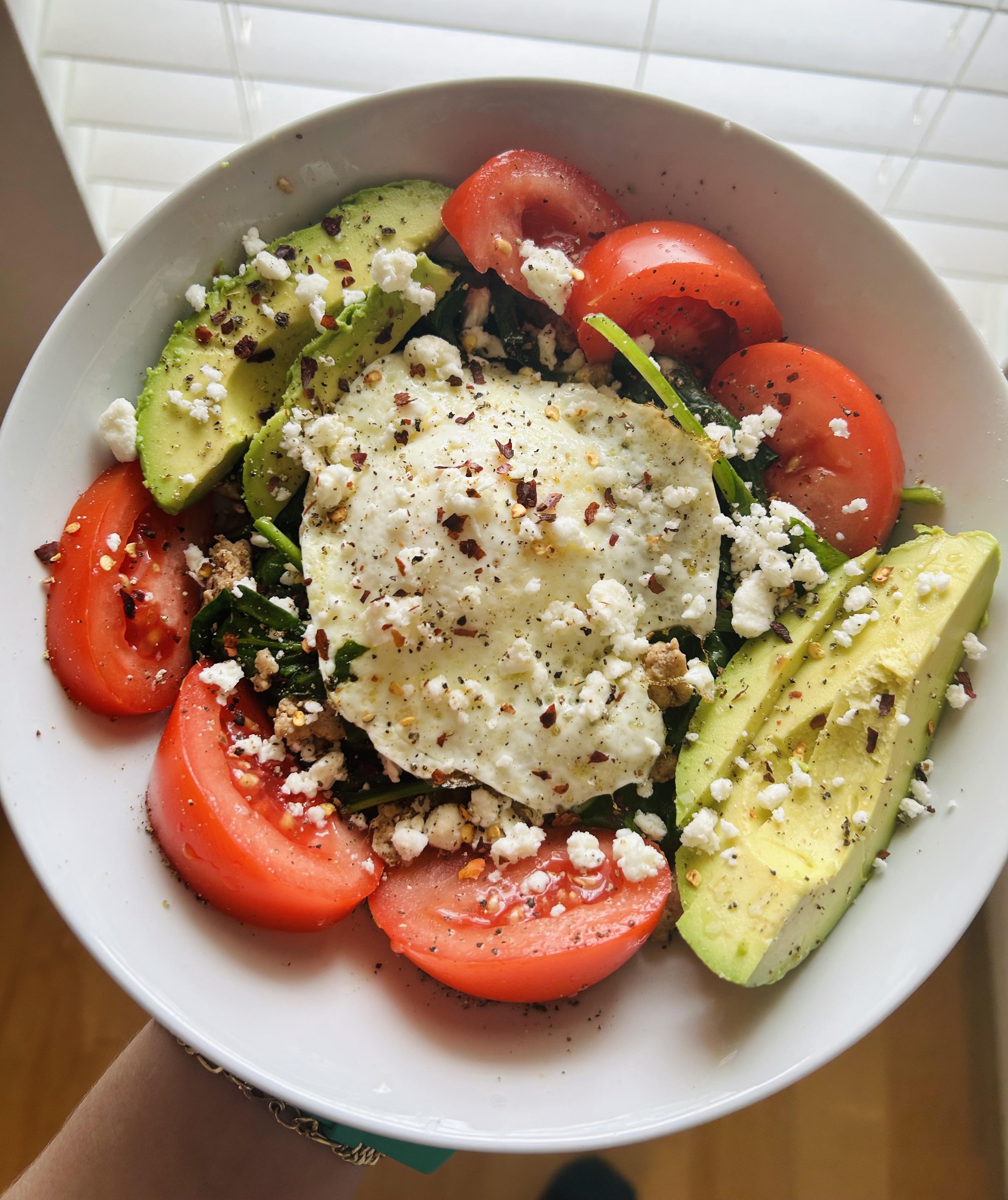 Breakfast! Ground turkey w/ sautéed spinach & feta. Over easy egg