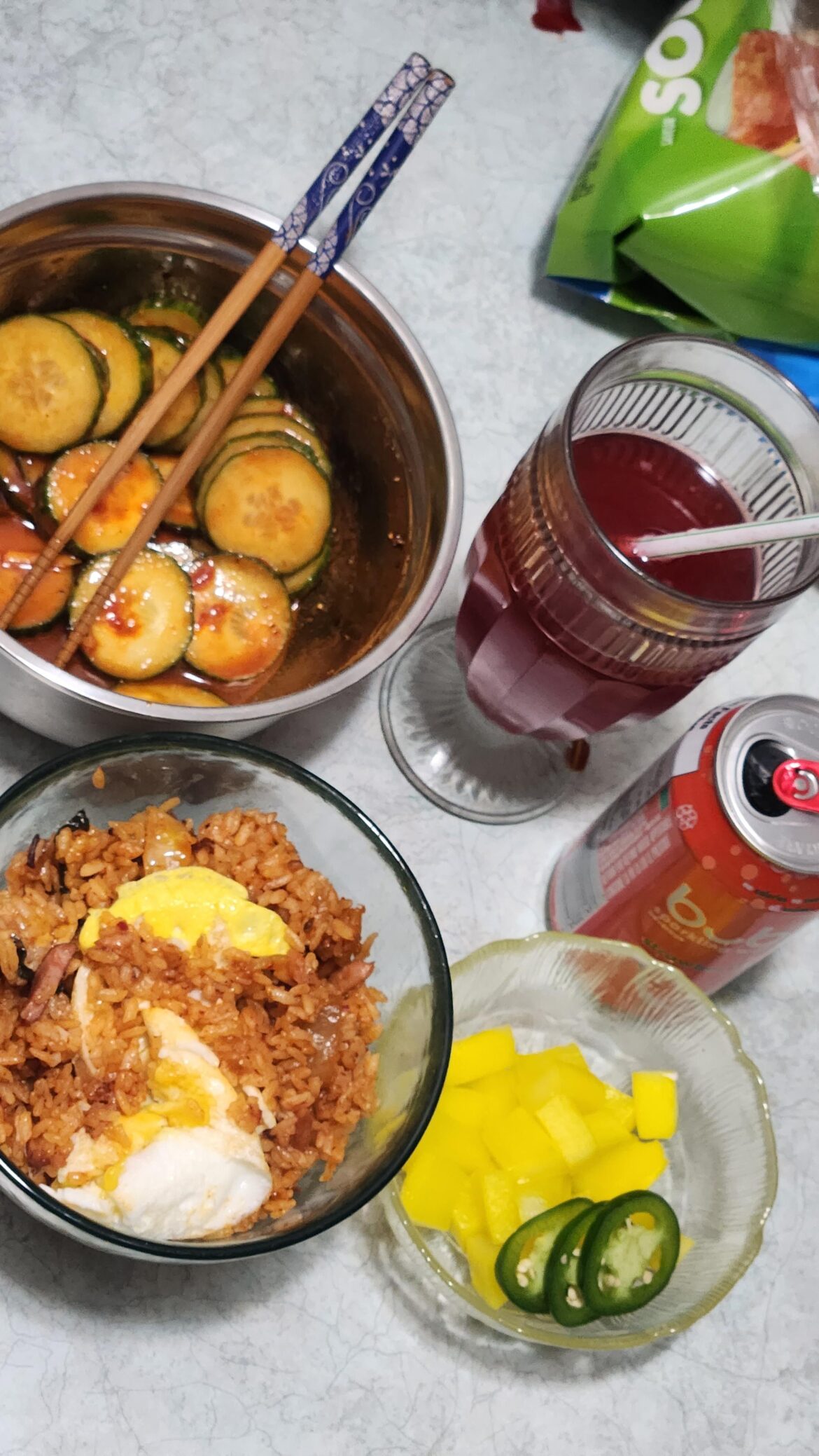 spam and kimchi fried rice with egg, cucumber salad, pickled radish