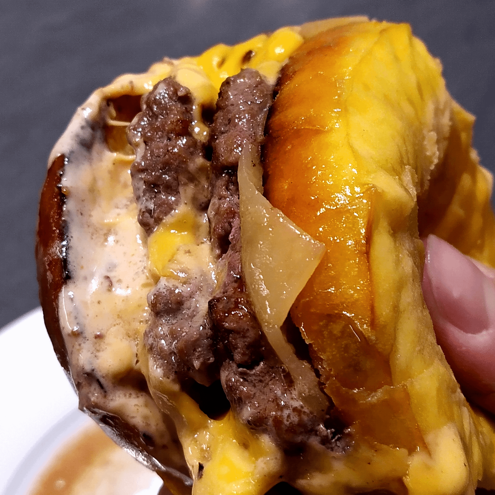 double cheese burger, bacon fat mayo, honey potato milk bun Dining